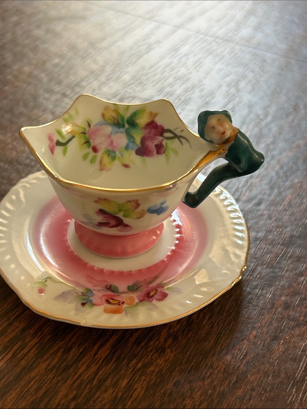 Vintage Hand painted made in Japan teacup & saucer w/elf handle